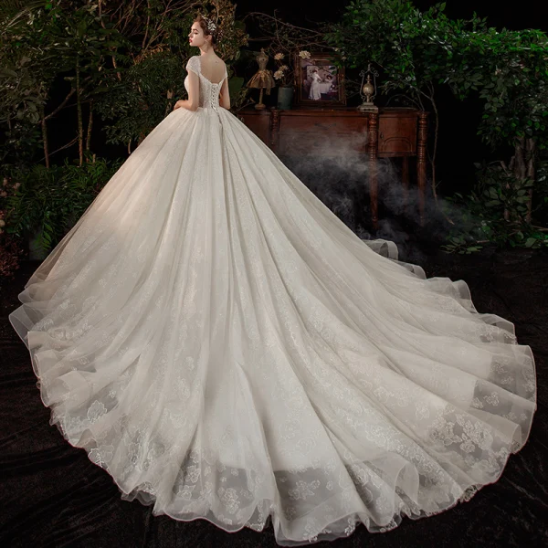 High-end Ivory Bridal Wedding Dresses 2020 Ball Gown See-through Scoop Neck Short Sleeve Backless Appliques Lace Beading Pearl Cathedral Train