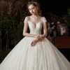 High-end Ivory Bridal Wedding Dresses 2020 Ball Gown See-through Scoop Neck Short Sleeve Backless Appliques Lace Beading Pearl Cathedral Train