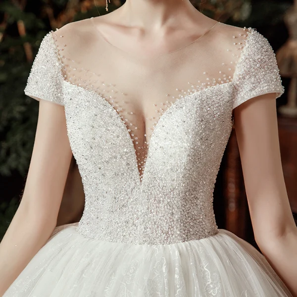 High-end Ivory Bridal Wedding Dresses 2020 Ball Gown See-through Scoop Neck Short Sleeve Backless Appliques Lace Beading Pearl Cathedral Train