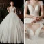 High-end Ivory Bridal Wedding Dresses 2020 Ball Gown See-through Scoop Neck Short Sleeve Backless Appliques Lace Beading Pearl Cathedral Train