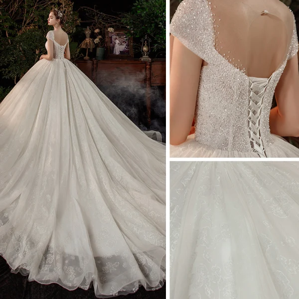 High-end Ivory Bridal Wedding Dresses 2020 Ball Gown See-through Scoop Neck Short Sleeve Backless Appliques Lace Beading Pearl Cathedral Train