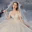 Elegant Champagne Corset Wedding Dresses 2020 Ball Gown Off-The-Shoulder Short Sleeve Backless Rhinestone Glitter Tulle Cathedral Train Ruffle
