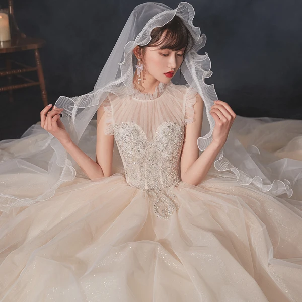 Vintage / Originale Champagne Transparentes La Mariée Robe De Mariée 2020 Robe Boule Col Haut Sans Manches Dos Nu Perlage Perle Glitter Tulle Paillettes Cathedral Train Volants