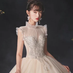Vintage Champagne Genomskinliga Brud Bröllopsklänningar 2020 Balklänning Hög Hals Ärmlös Halterneck Beading Pärla Glittriga Glitter Tyll Paljetter Cathedral Train Ruffle