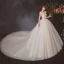 High End Ivory / Creme Durchsichtige Hochzeits Brautkleider / Hochzeitskleider 2020 Ballkleid Rundhalsausschnitt Kurze Ärmel Rückenfreies Perlenstickerei Glanz Tülle Kathedrale Schleppe Rüschen