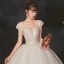 High End Ivory / Creme Durchsichtige Hochzeits Brautkleider / Hochzeitskleider 2020 Ballkleid Rundhalsausschnitt Kurze Ärmel Rückenfreies Perlenstickerei Glanz Tülle Kathedrale Schleppe Rüschen