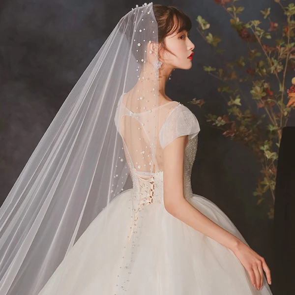 High-end Ivory See-through Bridal Wedding Dresses 2020 Ball Gown Scoop Neck Short Sleeve Backless Beading Glitter Tulle Cathedral Train Ruffle
