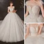 High End Ivory / Creme Durchsichtige Hochzeits Brautkleider / Hochzeitskleider 2020 Ballkleid Rundhalsausschnitt Kurze Ärmel Rückenfreies Perlenstickerei Glanz Tülle Kathedrale Schleppe Rüschen