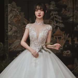 Vintage Retro Ivory Outdoor Garden Wedding Dresses 2020 Ball Gown See Through High Neck Short Sleeve Backless Appliques Lace Beading Glitter Tulle Floor Length Long Ruffle