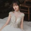 Vintage / Retro Ivory Outdoor / Garden Wedding Dresses 2020 Ball Gown See-through High Neck Short Sleeve Backless Appliques Lace Beading Glitter Tulle Floor-Length / Long Ruffle