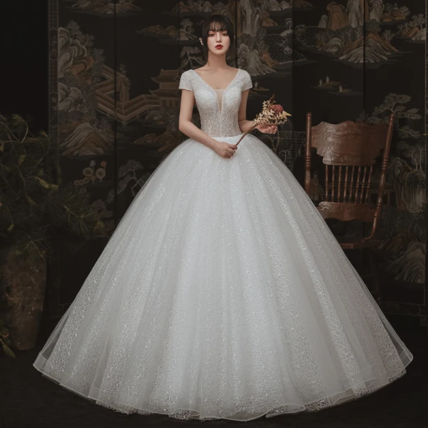High End Ivory / Creme Spitze Brautkleider / Hochzeitskleider 2020 Ballkleid Durchsichtige Tiefer V-Ausschnitt Kurze Ärmel Rückenfreies Handgefertigt Perlenstickerei Glanz Tülle Lange Rüschen