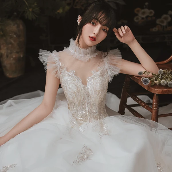Vintage / Originale Ivoire Jardin / Extérieur Robe De Mariée 2020 Robe Boule Transparentes Col Haut Sans Manches Dos Nu Appliques Paillettes Perlage Longue Volants