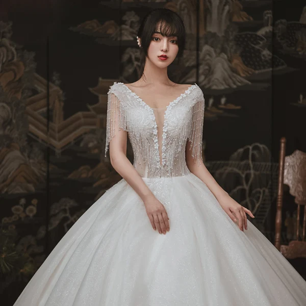 Elegant Ivory Outdoor / Garden Wedding Dresses 2020 Ball Gown See-through Deep V-Neck Sleeveless Backless Appliques Flower Pearl Beading Tassel Glitter Tulle Floor-Length / Long Ruffle