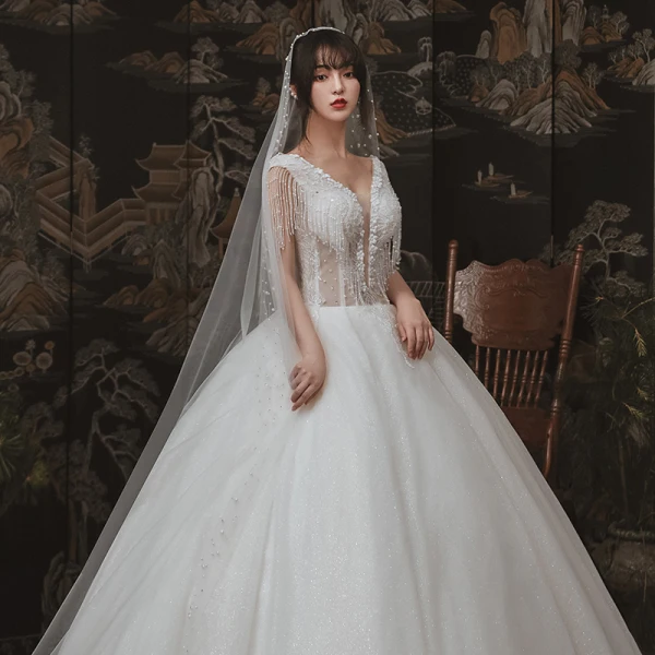 Elegant Ivory Outdoor / Garden Wedding Dresses 2020 Ball Gown See-through Deep V-Neck Sleeveless Backless Appliques Flower Pearl Beading Tassel Glitter Tulle Floor-Length / Long Ruffle