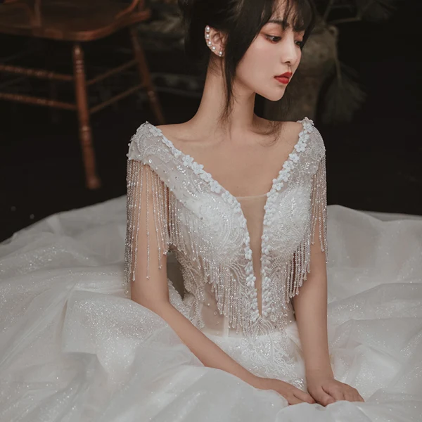 Elegant Ivory Outdoor / Garden Wedding Dresses 2020 Ball Gown See-through Deep V-Neck Sleeveless Backless Appliques Flower Pearl Beading Tassel Glitter Tulle Floor-Length / Long Ruffle