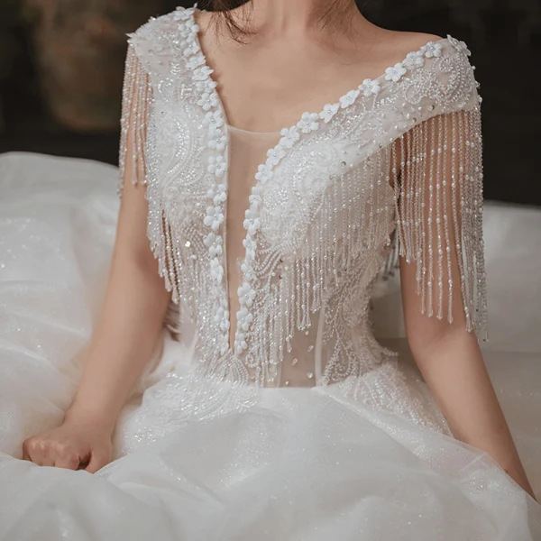 Elegant Ivory Outdoor / Garden Wedding Dresses 2020 Ball Gown See-through Deep V-Neck Sleeveless Backless Appliques Flower Pearl Beading Tassel Glitter Tulle Floor-Length / Long Ruffle