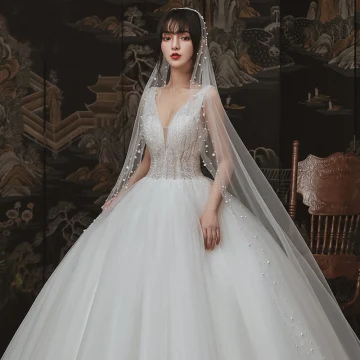 Chic Beautiful Ivory Outdoor Garden Wedding Dresses 2020 Ball Gown See Through Deep V Neck Sleeveless Backless Beading Floor Length Long Ruffle