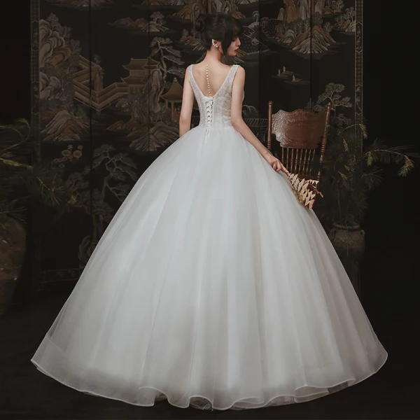 Chic / Beautiful Ivory Outdoor / Garden Wedding Dresses 2020 Ball Gown See-through Deep V-Neck Sleeveless Backless Beading Floor-Length / Long Ruffle