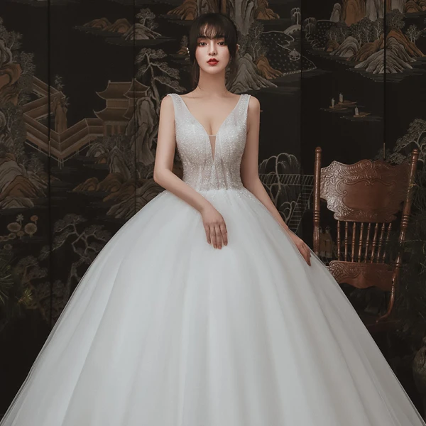 Chic / Beautiful Ivory Outdoor / Garden Wedding Dresses 2020 Ball Gown See-through Deep V-Neck Sleeveless Backless Beading Floor-Length / Long Ruffle