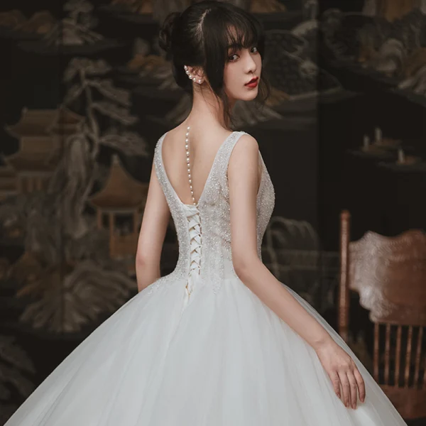 Chic / Beautiful Ivory Outdoor / Garden Wedding Dresses 2020 Ball Gown See-through Deep V-Neck Sleeveless Backless Beading Floor-Length / Long Ruffle