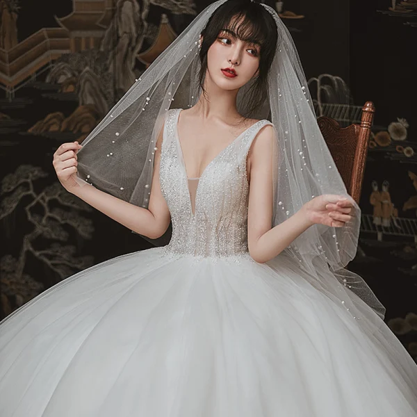 Chic / Beautiful Ivory Outdoor / Garden Wedding Dresses 2020 Ball Gown See-through Deep V-Neck Sleeveless Backless Beading Floor-Length / Long Ruffle