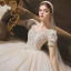 Vintage / Retro Audrey Hepburn Style Champagne Bridal Wedding Dresses 2020 Ball Gown See-through Scoop Neck Puffy Short Sleeve Backless Beading Glitter Tulle Chapel Train Ruffle