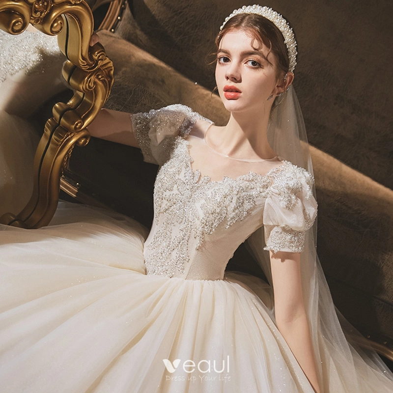 Vintage Originale Style Audrey Hepburn Champagne La Mariee Robe De Mariee 2020 Robe Boule Transparentes Encolure Degagee Gonflee Manches Courtes Dos Nu Perlage Glitter Tulle Chapel Train Volants