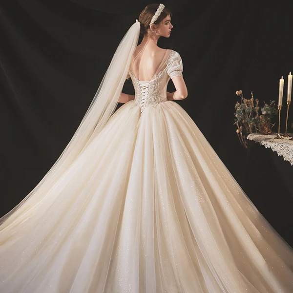 Vintage / Retro Audrey Hepburn Style Champagne Bridal Wedding Dresses 2020 Ball Gown See-through Scoop Neck Puffy Short Sleeve Backless Beading Glitter Tulle Chapel Train Ruffle