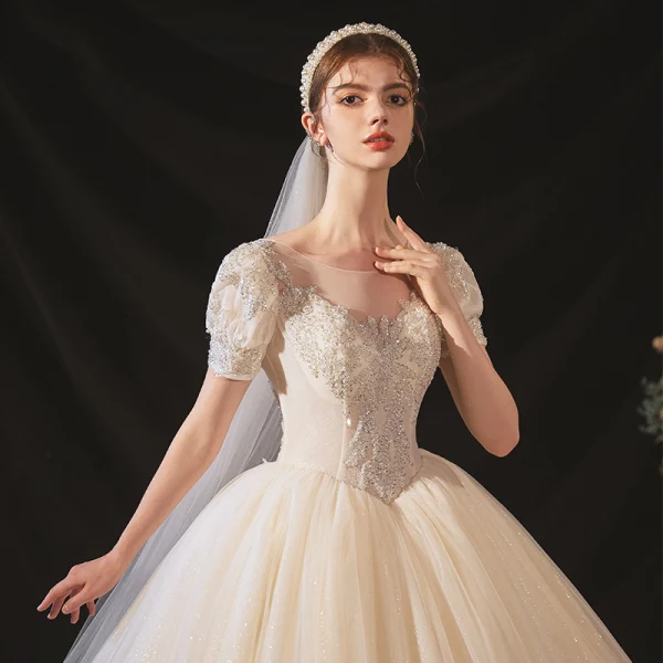 Vintage / Retro Audrey Hepburn Style Champagne Bridal Wedding Dresses 2020 Ball Gown See-through Scoop Neck Puffy Short Sleeve Backless Beading Glitter Tulle Chapel Train Ruffle