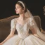 Vintage / Retro Audrey Hepburn Style Champagne Bridal Wedding Dresses 2020 Ball Gown See-through Scoop Neck Puffy Short Sleeve Backless Beading Glitter Tulle Chapel Train Ruffle