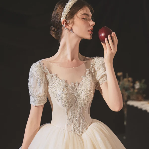 Vintage / Retro Audrey Hepburn Style Champagne Bridal Wedding Dresses 2020 Ball Gown See-through Scoop Neck Puffy Short Sleeve Backless Beading Glitter Tulle Chapel Train Ruffle