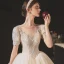 Vintage / Retro Audrey Hepburn Style Champagne Bridal Wedding Dresses 2020 Ball Gown See-through Scoop Neck Puffy Short Sleeve Backless Beading Glitter Tulle Chapel Train Ruffle