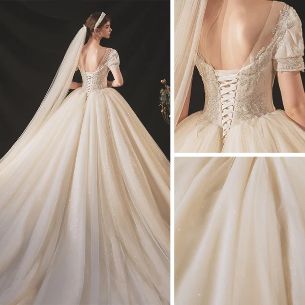 Vintage / Retro Audrey Hepburn Style Champagne Bridal Wedding Dresses 2020 Ball Gown See-through Scoop Neck Puffy Short Sleeve Backless Beading Glitter Tulle Chapel Train Ruffle