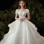 Style Victorien Ivoire La Mariée Robe De Mariée 2020 Robe Boule Transparentes Encolure Dégagée Gonflée Manches Courtes Dos Nu Appliques Fleur En Dentelle Perlage Paillettes Cathedral Train Volants