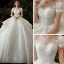 Style Victorien Ivoire La Mariée Robe De Mariée 2020 Robe Boule Transparentes Encolure Dégagée Gonflée Manches Courtes Dos Nu Appliques Fleur En Dentelle Perlage Paillettes Cathedral Train Volants