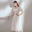 Chic / Belle Blanche Chiffon de retour Robe De Graduation 2020 Princesse Encolure Carrée Gonflée Manches Courtes Thé Longueur Volants Dos Nu Robe De Ceremonie