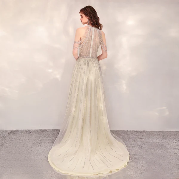 Haute Basse Champagne Transparentes Robe De Cocktail 2020 Princesse Encolure Dégagée Sans Manches Fait main Perlage Asymétrique Volants Robe De Ceremonie