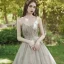 Élégant Champagne Robe De Bal 2020 Princesse Bretelles Spaghetti Sans Manches Appliques En Dentelle Faux Diamant Longue Volants Dos Nu Robe De Ceremonie
