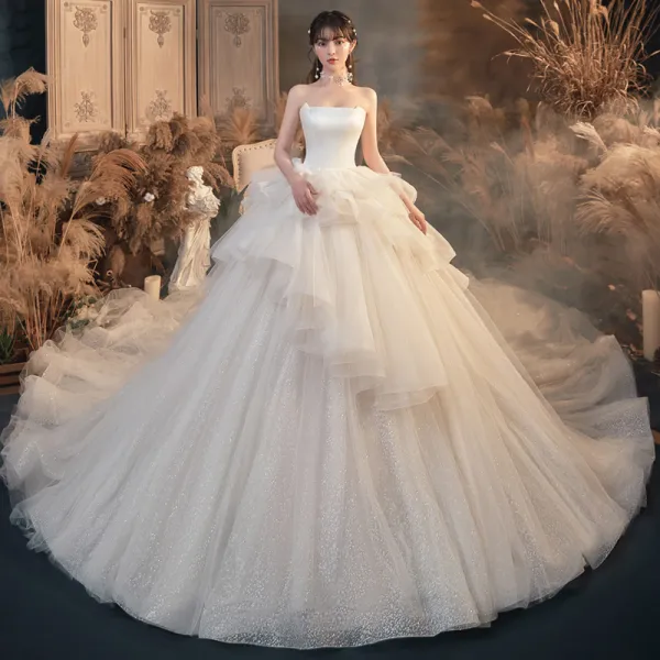 Romantic Ivory Bridal Wedding Dresses 2020 Ball Gown Strapless Sleeveless Backless Glitter Tulle Cathedral Train Ruffle