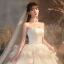 Romantique Ivoire La Mariée Robe De Mariée 2020 Robe Boule Bustier Sans Manches Dos Nu Glitter Tulle Cathedral Train Volants
