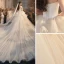 Romantique Ivoire La Mariée Robe De Mariée 2020 Robe Boule Bustier Sans Manches Dos Nu Glitter Tulle Cathedral Train Volants