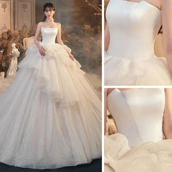 Romantique Ivoire La Mariée Robe De Mariée 2020 Robe Boule Bustier Sans Manches Dos Nu Glitter Tulle Cathedral Train Volants