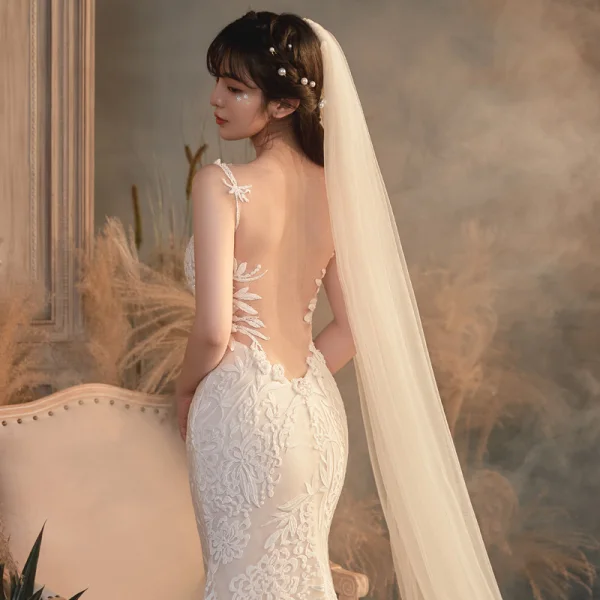 Illusion Champagne Transparentes La Mariée Robe De Mariée 2020 Trompette / Sirène Encolure Dégagée Sans Manches Dos Nu Appliques En Dentelle Perlage Train De Balayage Volants