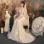 Illusion Champagne Transparentes La Mariée Robe De Mariée 2020 Trompette / Sirène Encolure Dégagée Sans Manches Dos Nu Appliques En Dentelle Perlage Train De Balayage Volants