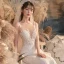 Illusion Champagne Transparentes La Mariée Robe De Mariée 2020 Trompette / Sirène Encolure Dégagée Sans Manches Dos Nu Appliques En Dentelle Perlage Train De Balayage Volants