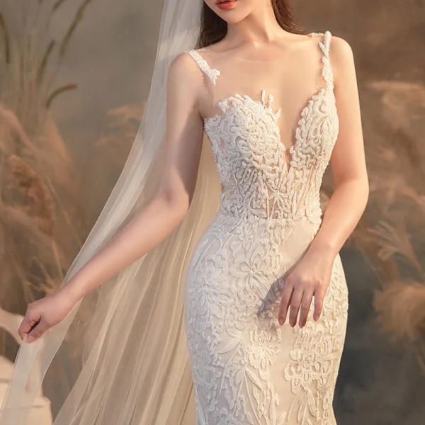 Illusion Champagne Transparentes La Mariée Robe De Mariée 2020 Trompette / Sirène Encolure Dégagée Sans Manches Dos Nu Appliques En Dentelle Perlage Train De Balayage Volants