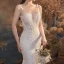 Illusion Champagne Transparentes La Mariée Robe De Mariée 2020 Trompette / Sirène Encolure Dégagée Sans Manches Dos Nu Appliques En Dentelle Perlage Train De Balayage Volants