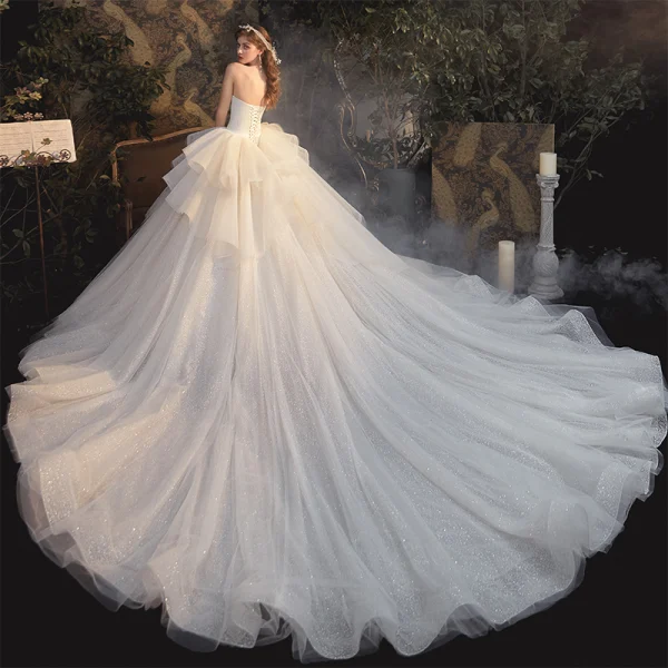 Luxury / Gorgeous Champagne Bridal Wedding Dresses 2020 Ball Gown Strapless Sleeveless Backless Glitter Tulle Cathedral Train Ruffle
