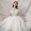 Chic / Belle Blanche La Mariée Robe De Mariée 2020 Robe Boule De l'épaule Manches Courtes Dos Nu Glitter Tulle Cathedral Train Volants