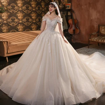 Roman Champagne Bridal Wedding Dresses 2020 Ball Gown Off The Shoulder Short Sleeve Backless Appliques Lace Beading Glitter Tulle Cathedral Train Ruffle